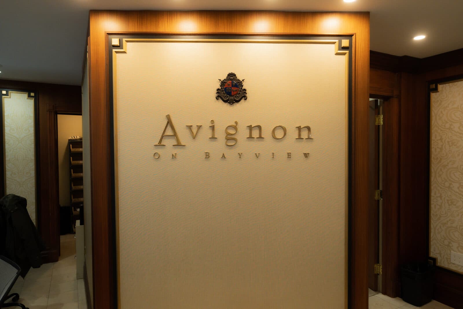 The Avignon name panel set into a mahogany frame