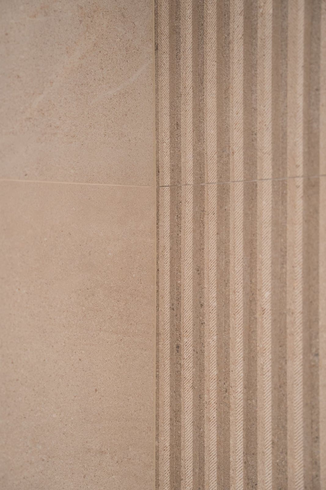Fluted stone column edge finished smooth