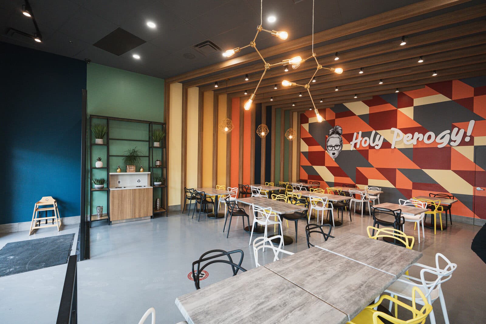 Open dining area with painted feature walls and window seating